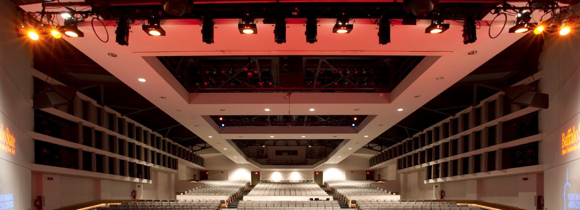 Ceiling of Performing Arts Center with theatrical lighting as seen from the stage.