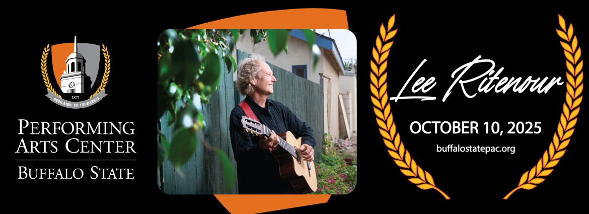 Photo of Lee Ritenour with guitar